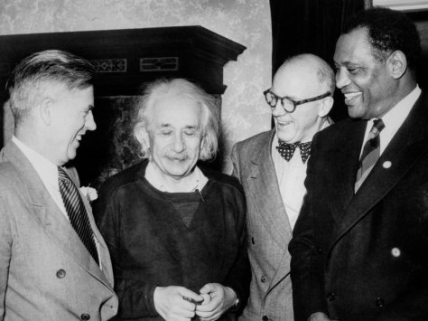 From left: Former Vice-President Henry A. Wallace, Albert Einstein, Lewis Wallace, and Paul Robeson. Einstein had invited Wallace (who was running for President in 1948) and singer/actor/civil-rights activist Robeson to his house to discuss anti-lynching activism. Robeson asked Einstein to co-chair his  organization, American Crusade Against Lynching (ACAL). [Credit: Bettmann / Getty Images]